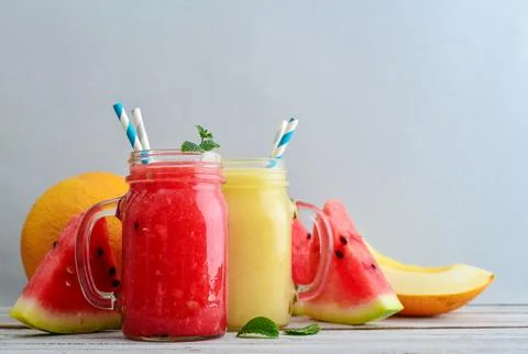 Watermelon and melon smoothie in  jars Stock Photos