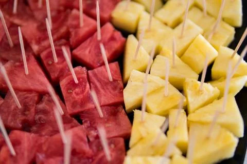Watermelon and pineapple on a toothpick Foto stock