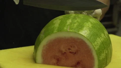 Watermelon being sliced Stock Footage 142160066