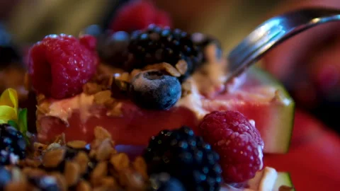 Watermelon cake on a slice watermelon pieces berries and granules cream edible Stock Footage 293337440