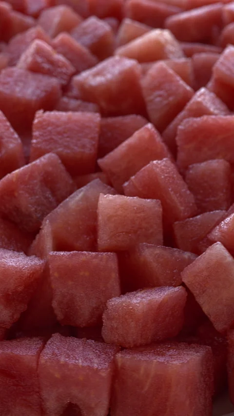Watermelon chunks background. Selective focus. Vertical video. Video stock 311799178