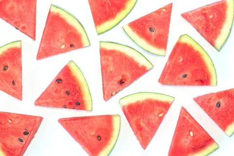 Watermelon chunks pattern on white background. Stock Photos
