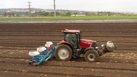 Watermelon cultivation process with a Seeding tractor. Stock Footage 130099427