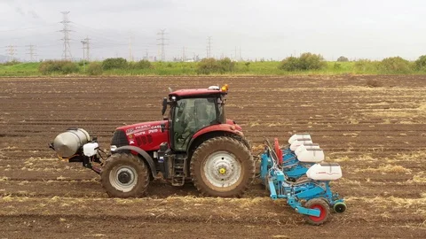 Watermelon cultivation process with a Seeding tractor. Stock Footage 130099688