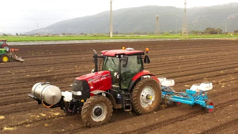 Watermelon cultivation process with a Seeding tractor. Stock Footage 130100654