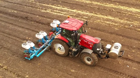 Watermelon cultivation process with a Seeding tractor. Stock Footage 130100914