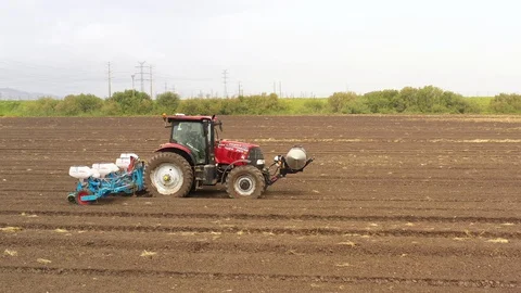 Watermelon cultivation process with a Seeding tractor. Stock Footage 130101250
