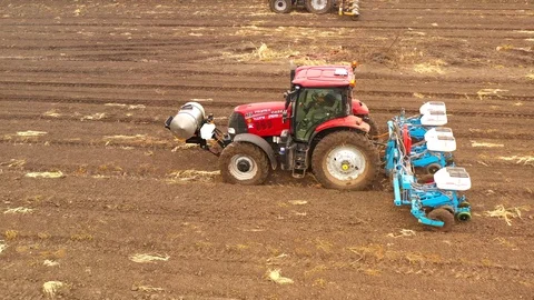 Watermelon cultivation process with a Seeding tractor. Stock Footage 130102791