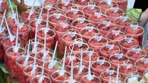 Watermelon fruit in plastic cups at Moscow market Stock Footage 318311932