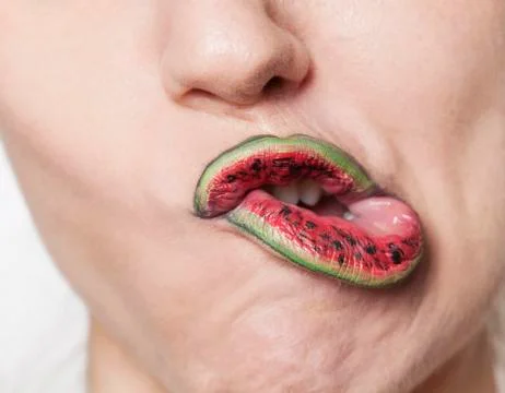 Watermelon lips grimacing Stock Photos