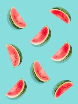 Watermelon pattern. Slices of watermelon on a plain surface painted in bright Stock Photos