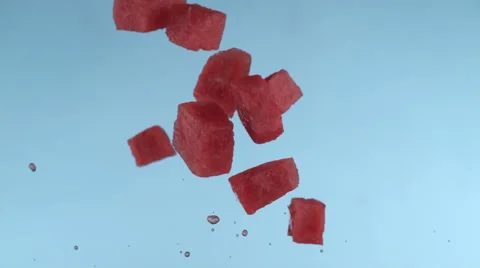 Watermelon pieces flying in slow motion, shot with Phantom Flex 4K at 1000 Stock Footage 66776636