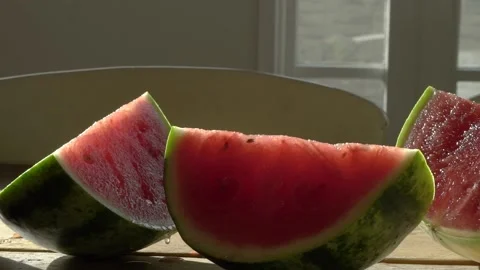Watermelon pieces in the sun Stock Footage 144739425