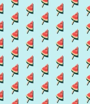 Watermelon popsicle on blue seamles pattern watermelon popsicle seamless p... Stock Photos