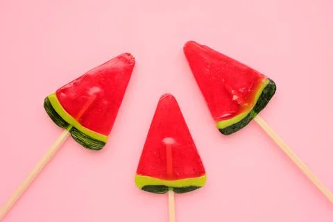 Watermelon popsicle on pink colored backdrop. Stock-Fotos