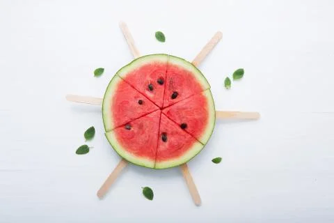 Watermelon slice popsicles on white background Stock Photos