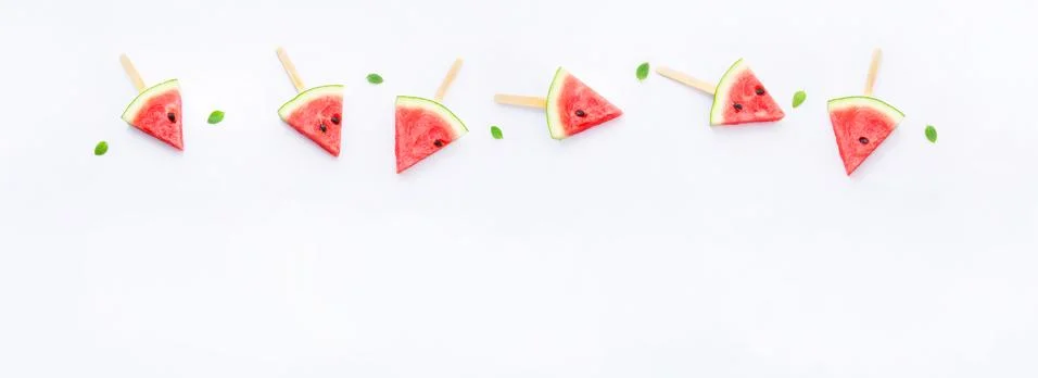Watermelon slice popsicles on white background Stock Photos