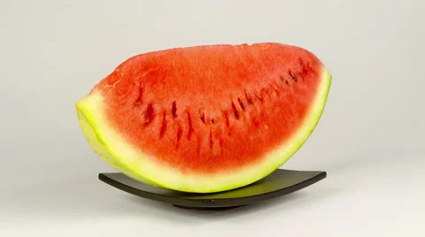 Watermelon slice rotation on a white background, 4K Video stock 47431953