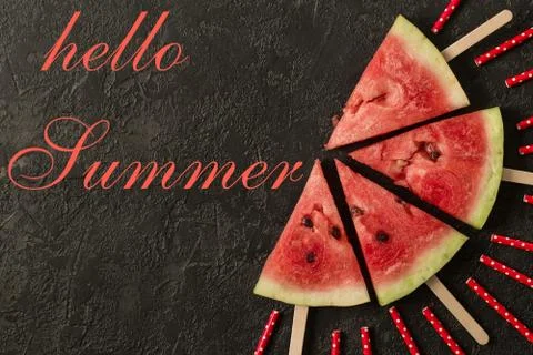 Watermelon slice with text Hello Summer, on dark background Stock Photos