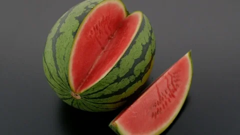 Watermelon Sliced on Turntable - Black Background Stock Footage 75869341