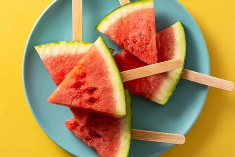 Watermelon slices popsicles Stock Photos