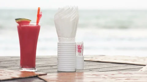 Watermelon smoothie on wooden table near the sea. Stock Footage 25603653