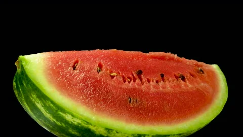 Watermelon spin on a black background, watermelon in the cut, copy space, slice Stock Footage 160943089