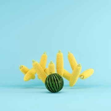 Watermelon strike with Corn on blue background. Fruit Minimal ideas concept. Stock Illustration