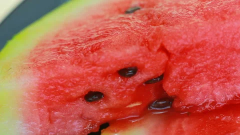 Watermelon on talc rotates. Video stock 94142980