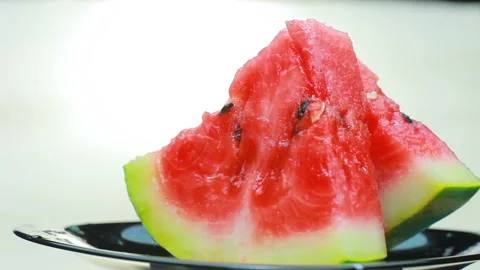 Watermelon on talc rotates. Video stock 94163513