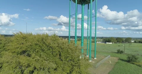 Watermelon Water Tower in Luling, Texas - Aerial Drone View Stock Footage 118169645