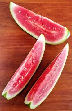 Watermelon on wooden table Stock Photos