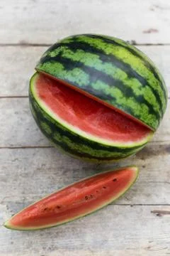 Watermelon on a wooden table Fotos Stock