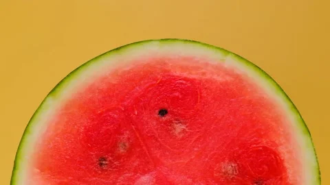 Watermelon on a yellow  background. Watermelon pulp close-up Stock Footage 170509079