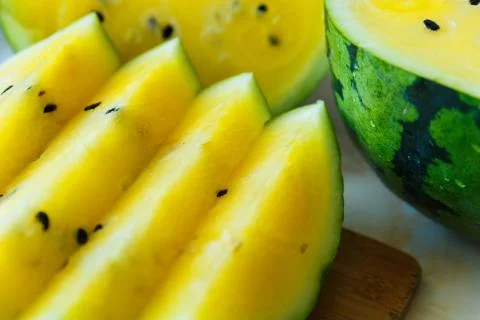 Watermelon with yellow softness inside. Stock Photos