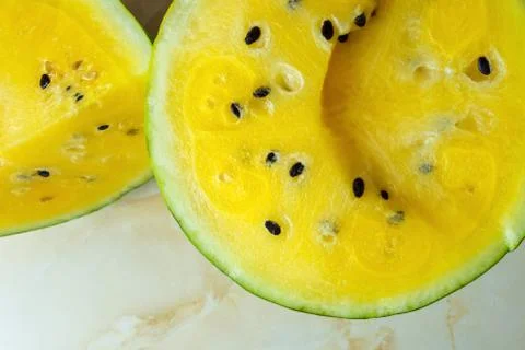 Watermelon with yellow softness inside. Stock Photos