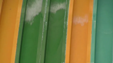 Waterpark Visitors (Unrecognizable) Speeding Down Slides Video stock 24675869