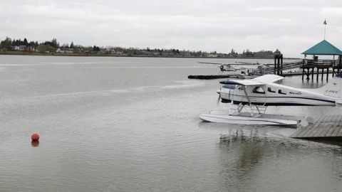 Waterplane moving on lake surface getting ready to take of from water Stock Footage 98568930