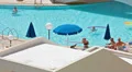 Waterpool area with resting people in Cypriot three stars hotel HD Footage