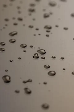 Waterproof smooth surface completely wet, part of the phone covered with drop Stock Photos