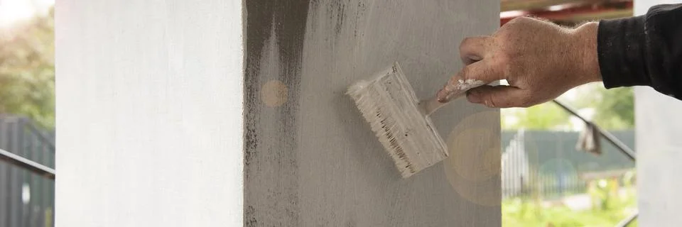 Waterproofing, priming process Stock Photos