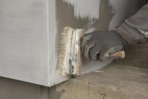 Waterproofing, priming process Stock Photos