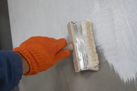 Waterproofing, priming process Stock Photos