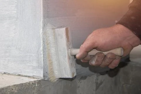 Waterproofing, priming process Stock Photos