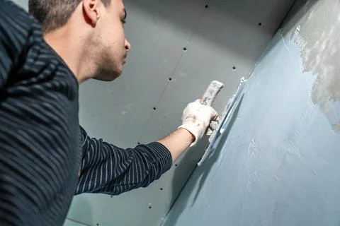 Waterproofing of the wall under ceramic tiling 스톡 사진