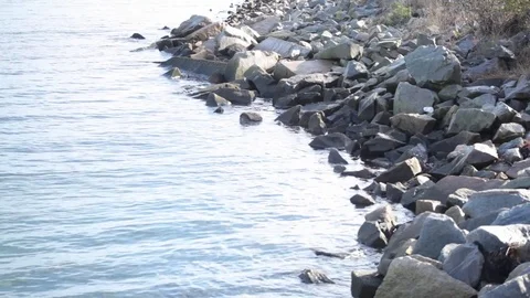 Waters against rocks Stock Footage 73745110