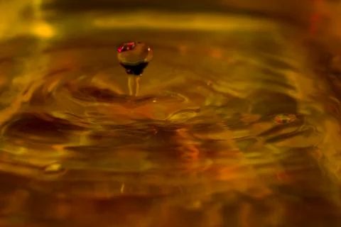 A water's drop falling Stock Photos