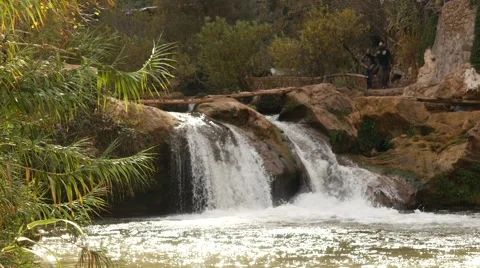 Waters flow river in Morocco with tourists Stock Footage 58398574