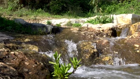 Waters flowing over the rocks Stock Footage 157481164