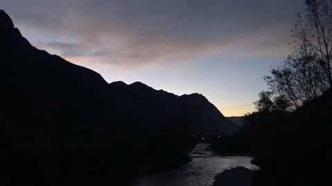 The waters of the Pioverna River flow in the evening twilight, Valsassina Vídeo Stock 142283725